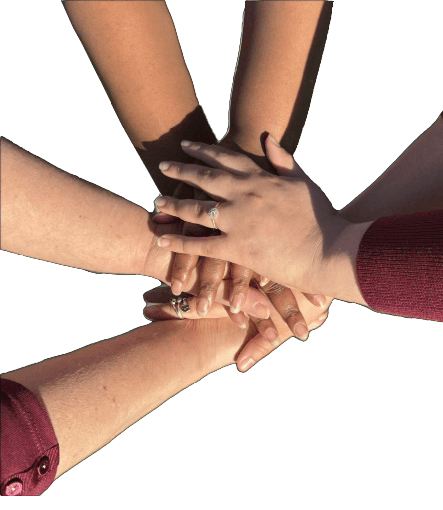 Diverse hands stacked together, symbolizing unity and collaboration. The image highlights teamwork and community support.